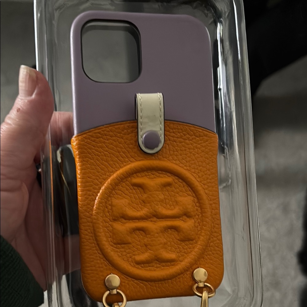 Tory Burch Orange and Purple Phone Case with Logo and lanyard.